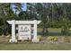 Welcome to Crescent Cove, featuring a beautiful community sign surrounded by lush landscaping at 1336 Winding Creek Way, Myrtle Beach, SC 29588