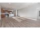 Open-concept living space featuring a kitchen with stainless steel appliances and wood flooring at 1336 Winding Creek Way, Myrtle Beach, SC 29588