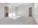 Main bedroom with tray ceiling, ensuite bathroom and a walk-in closet at 1336 Winding Creek Way, Myrtle Beach, SC 29588