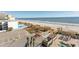 Aerial view of beach, parking, and building at 1501 S Ocean Blvd. # 623, Myrtle Beach, SC 29577