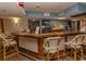 Inviting bar with wicker chairs and various alcohol selections at 1501 S Ocean Blvd. # 623, Myrtle Beach, SC 29577