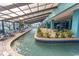 Relaxing indoor lazy river pool with shaded seating at 1501 S Ocean Blvd. # 623, Myrtle Beach, SC 29577