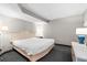 Bedroom with king-size bed and simple decor at 1501 S Ocean Blvd. # 846, Myrtle Beach, SC 29577
