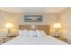 Comfortable bedroom features king bed, nightstands and lamps at 1501 S Ocean Blvd. S # 1450, Myrtle Beach, SC 29577