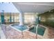 Inviting hot tub with tiled surround at 1501 S Ocean Blvd. S # 1450, Myrtle Beach, SC 29577