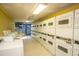The laundry room with rows of coin operated washer and dryers for residential use at 1501 S Ocean Blvd. S # 1450, Myrtle Beach, SC 29577
