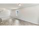 Open living area with wood-look flooring, ample lighting, and neutral paint provides a versatile living space at 1508 Clubstone Dr., Conway, SC 29526