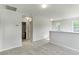 Cozy loft area with plush carpeting, natural light, and entryways to bedrooms and bathrooms at 1508 Clubstone Dr., Conway, SC 29526