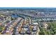 Aerial view of community showing homes, pools, and landscape at 1870 Auburn Ln. # 21J, Surfside Beach, SC 29575