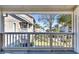 Balcony view overlooking the community's grassy courtyard and pool at 1870 Auburn Ln. # 21J, Surfside Beach, SC 29575