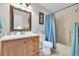 Clean bathroom with a bathtub, toilet and wood vanity at 1870 Auburn Ln. # 21J, Surfside Beach, SC 29575