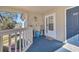 Inviting entryway with patio furniture and view of surrounding landscape at 1870 Auburn Ln. # 21J, Surfside Beach, SC 29575