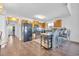 Well-equipped kitchen with black appliances and wood cabinets at 1870 Auburn Ln. # 21J, Surfside Beach, SC 29575