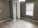 Recently renovated bedroom featuring fresh paint, a ceiling fan, and an opened closet at 206 W Pine St., Johnsonville, SC 29555