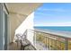 Condo balcony with ocean view featuring a table and chairs at 2701 S. Ocean B S Ocean Blvd. # 508, North Myrtle Beach, SC 29582