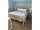 This bedroom features a queen bed, coastal decor, and ample natural light at 2701 S. Ocean B S Ocean Blvd. # 508, North Myrtle Beach, SC 29582