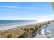 High-rise condo with ocean view, palm trees, and a swimming pool at 2701 S. Ocean B S Ocean Blvd. # 508, North Myrtle Beach, SC 29582