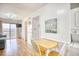 Condo dining area with small table and chairs near kitchen at 2710 S Ocean Blvd. # 207 A, Myrtle Beach, SC 29577