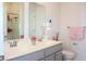 Main bathroom with double vanity and toilet at 3528 Bells Lake Circle # 3528, Longs, SC 29568