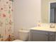 Clean bathroom with gray vanity, shower, and decorative shower curtain at 3528 Bells Lake Circle # 3528, Longs, SC 29568