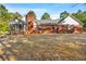 Brick house with a screened porch and large backyard at 3593 S Island Rd., Georgetown, SC 29440