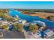 Aerial view of Little River Waterfront, featuring boats and restaurants at 3790 Woodridge Circle, Little River, SC 29566
