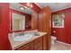 Bathroom with a sink, toilet and linen storage at 3790 Woodridge Circle, Little River, SC 29566