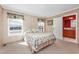 Bright bedroom with a comfortable bed and window views at 3790 Woodridge Circle, Little River, SC 29566