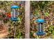 Two bird feeders with birds enjoying sunflower seeds at 3790 Woodridge Circle, Little River, SC 29566