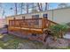 Elevated deck with brick base, offering ample outdoor space at 3790 Woodridge Circle, Little River, SC 29566