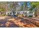 Single-wide manufactured home with wood siding and a spacious yard at 3790 Woodridge Circle, Little River, SC 29566