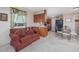 Kitchen with light wood cabinets, black appliances, and a breakfast bar at 3790 Woodridge Circle, Little River, SC 29566