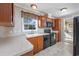 Kitchen with an island and a view into the adjacent living room at 3790 Woodridge Circle, Little River, SC 29566