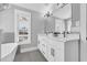 Bathroom with double vanity and white cabinets at 434 Stanley Dr., Murrells Inlet, SC 29576
