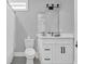 Clean bathroom with white vanity, gray walls, and a shower at 434 Stanley Dr., Murrells Inlet, SC 29576