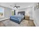 Comfortable bedroom with a grey upholstered bed and wood-look flooring at 434 Stanley Dr., Murrells Inlet, SC 29576