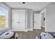 Bedroom with double doors to closet and window at 434 Stanley Dr., Murrells Inlet, SC 29576