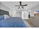 Main bedroom with king-size bed, ensuite bathroom, and laundry access at 434 Stanley Dr., Murrells Inlet, SC 29576