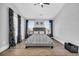 Main bedroom with a king-size bed and vaulted ceiling at 434 Stanley Dr., Murrells Inlet, SC 29576