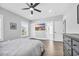 Spacious bedroom with large bed, ceiling fan, and ensuite bathroom access at 434 Stanley Dr., Murrells Inlet, SC 29576