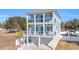 Two-story light blue house with white trim and double garage at 434 Stanley Dr., Murrells Inlet, SC 29576