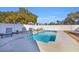 Inviting swimming pool with lounge chairs and a white fence at 434 Stanley Dr., Murrells Inlet, SC 29576