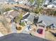An aerial view of the charming brick home and the neighboring properties in the community at 461 Spauldingwood Rd., Little River, SC 29566