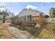 View of backyard and deck featuring wooden fencing, a patio, and mature trees at 461 Spauldingwood Rd., Little River, SC 29566
