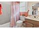 Functional bathroom featuring a combined tub and shower and a single sink vanity at 461 Spauldingwood Rd., Little River, SC 29566
