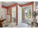 Bright entryway featuring tile flooring, a view of the exterior, and access to other rooms at 461 Spauldingwood Rd., Little River, SC 29566