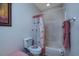 Simple bathroom with a toilet, tub, and shower at 5090 Windsor Green Way # 104, Myrtle Beach, SC 29579