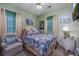 Bedroom with a double bed and sitting chair at 5090 Windsor Green Way # 104, Myrtle Beach, SC 29579