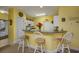 Kitchen with breakfast bar and white cabinets at 5090 Windsor Green Way # 104, Myrtle Beach, SC 29579