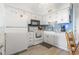 Well-equipped kitchen, white cabinets, granite counters at 5601 North Ocean Blvd. # B-312, Myrtle Beach, SC 29577